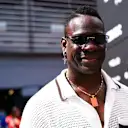 Mario Balotelli berpaling kepala ketika dia melangkah melalui paddock - penyerang Itali melukis sebagai banyak kamera sebagai kereta. Leretkan lebih banyak lagi