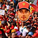 Ferrari Pride pada paparan penuh. Penyokong khusus menimbulkan bendera tinggi untuk Charles Leclerc.
