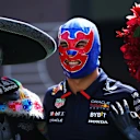 Checo memakai warisannya di atas dan di luar trek-dari topi keledar yang diilhamkan oleh Mexico ke pintu masuk Lucha Libre penuh, wira kampung halaman selalu membawa semangat