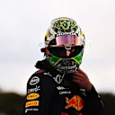 Helmet yang diilhamkan oleh bendera Brazil Max Verstappen untuk Grand Prix Sao Paulo pada tahun 2021