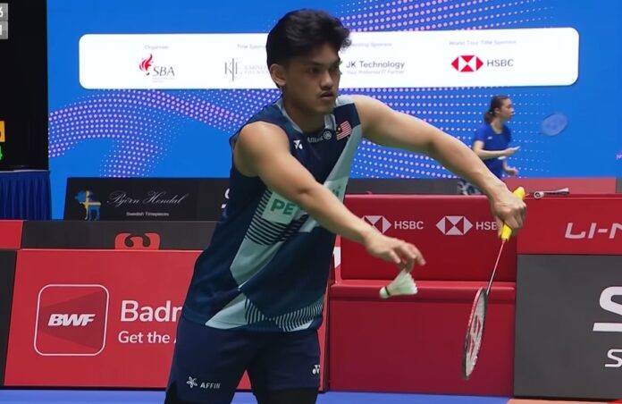 Mohd Haikal memohon maaf kepada jurulatih Herry Iman Pierngadi selepas menarik diri daripada Terbuka Switzerland. (Foto: BWF)